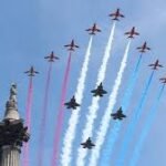 Royal Family Watch Red Arrows Flypast on Buckingham Palace Balcony